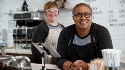 store employees behind a counter