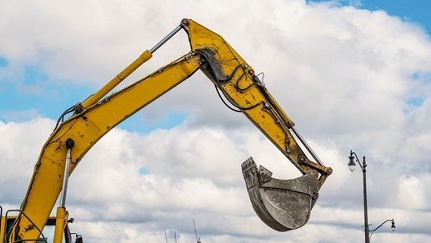 A construction excavator in action.