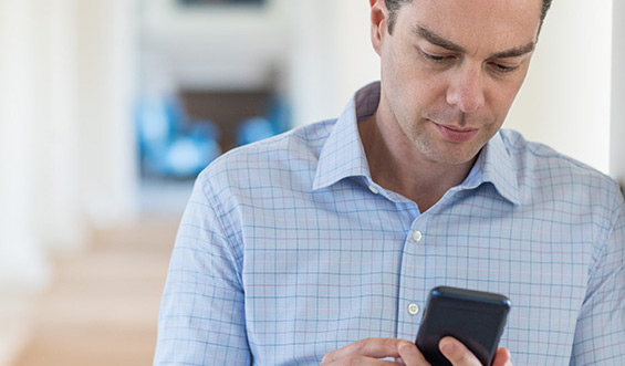 A person looking at their mobile device.