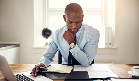 A professional reviewing a document.