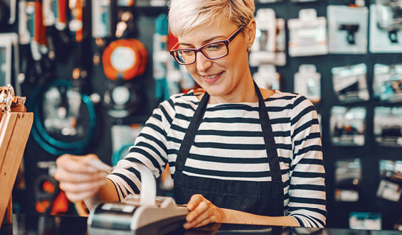 A cashier helping a customer.