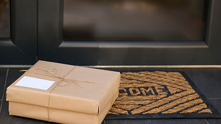 package on a welcome mat